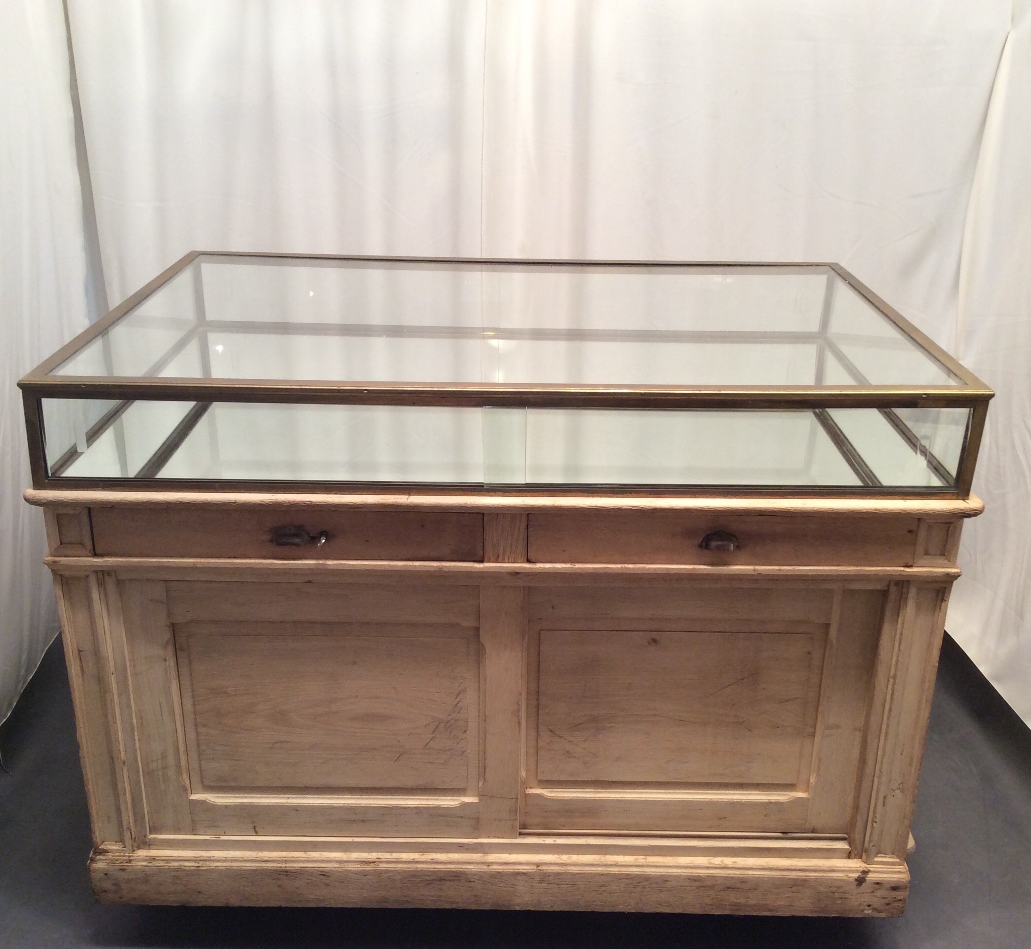 Vintage shop counter display Guy Laurent Setruk Antiquities