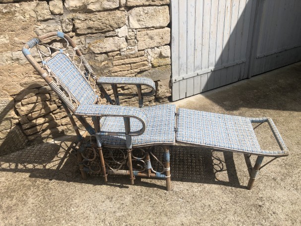 Old garden deck chair, winter garden.