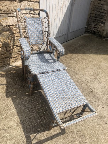 Old garden deck chair, winter garden.