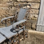 Old garden deck chair, winter garden.