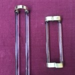 Two old pairs of door handles from a luxury store