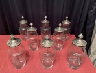 Suite de huit flacons, bocaux de confiserie.(vendu)