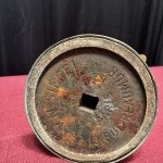 Ancien présentoir à vêtement de vitrine de magasin.